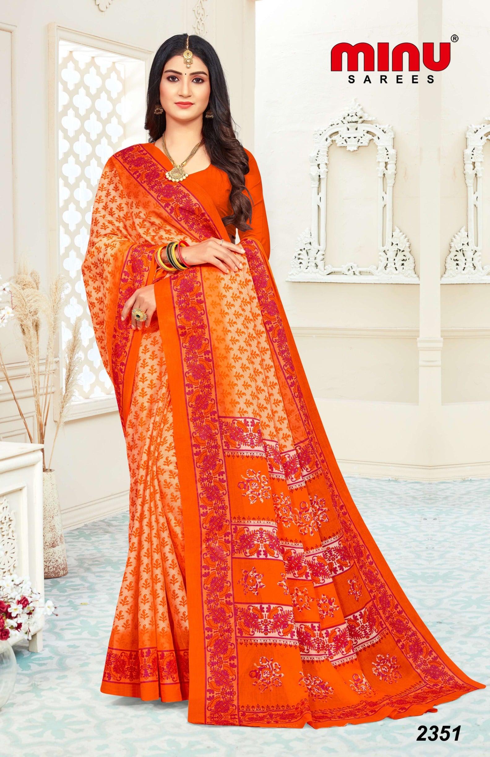 Online image of wholesale cotton saree wearing woman 