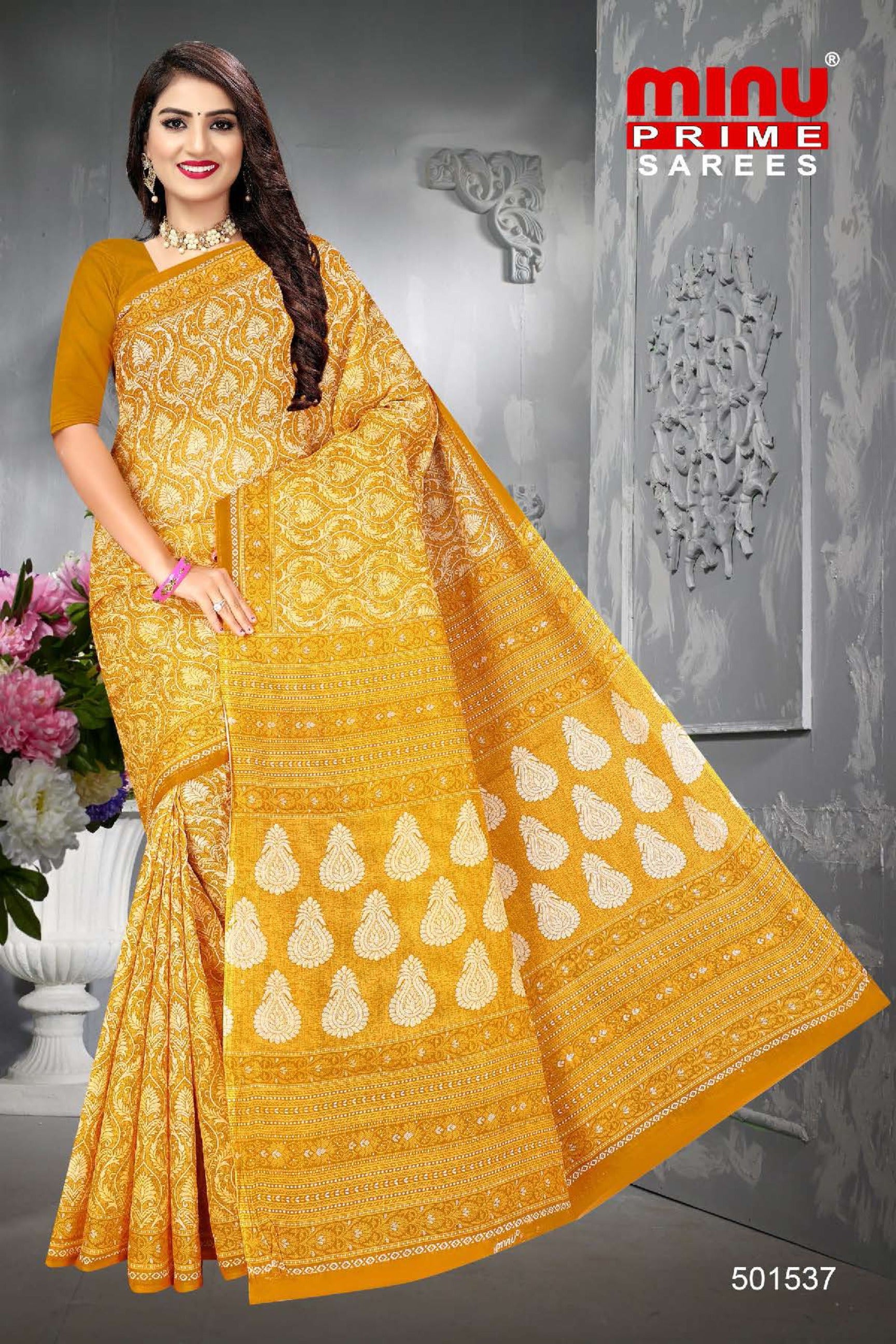 Woman wearing yellow sarees from saree wholesale market
