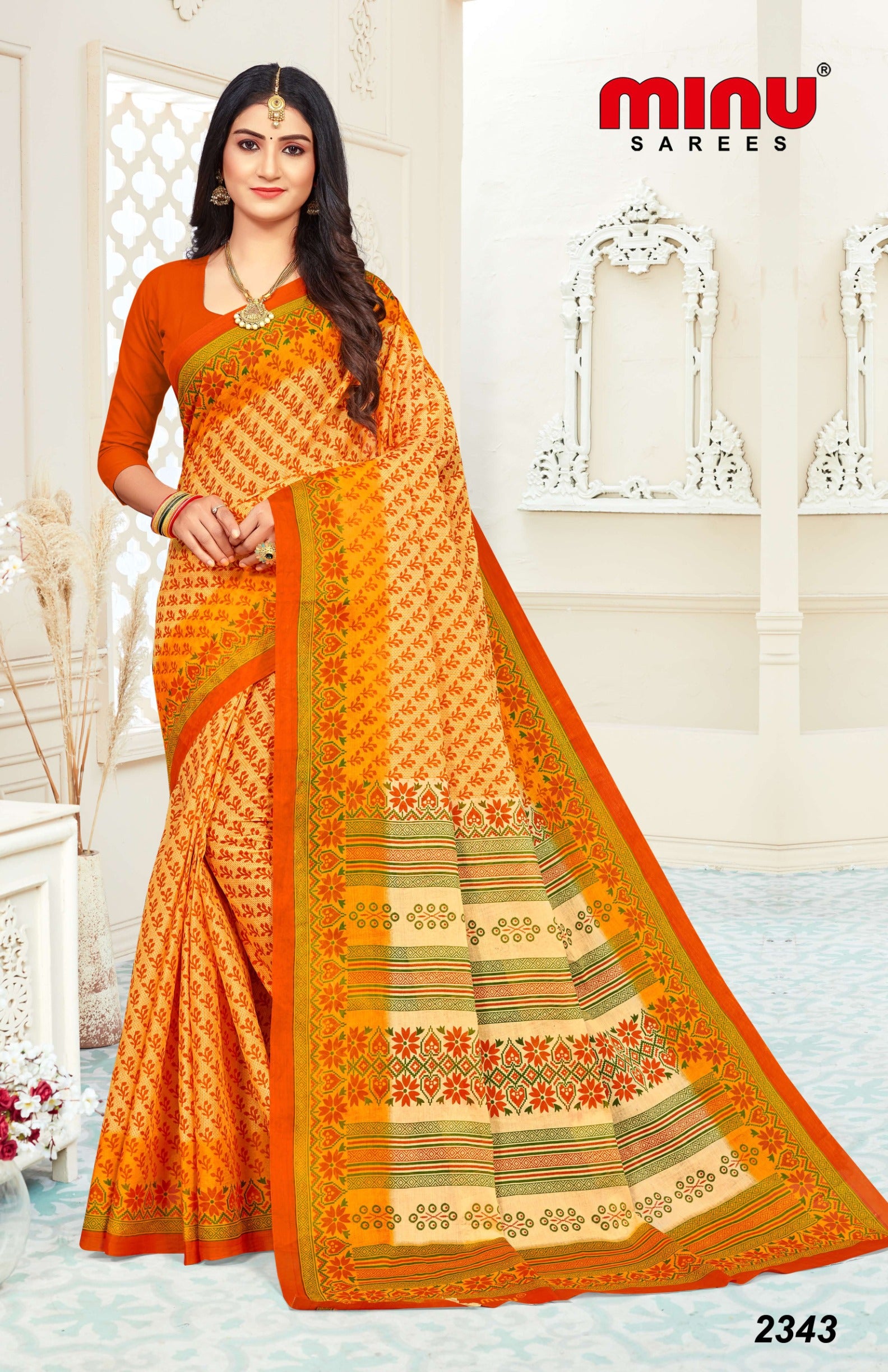 woman wearing orange color printed cotton saree 