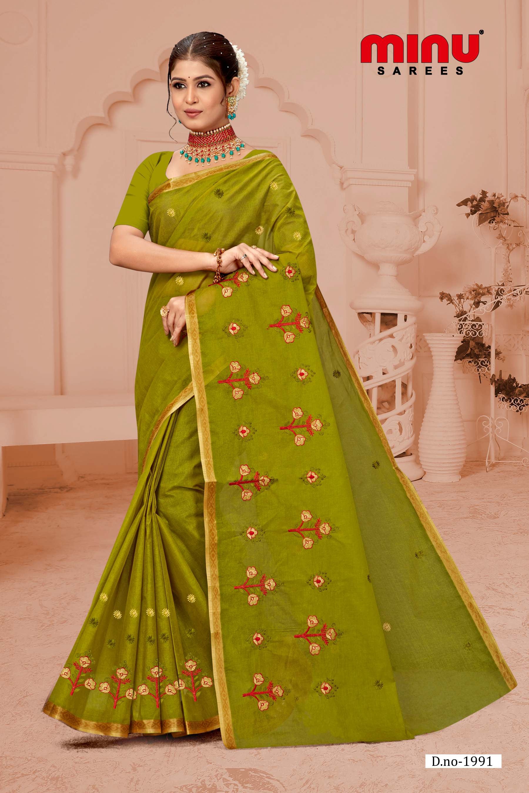 Green embroidery sarees wearing woman looking stylish and bold 