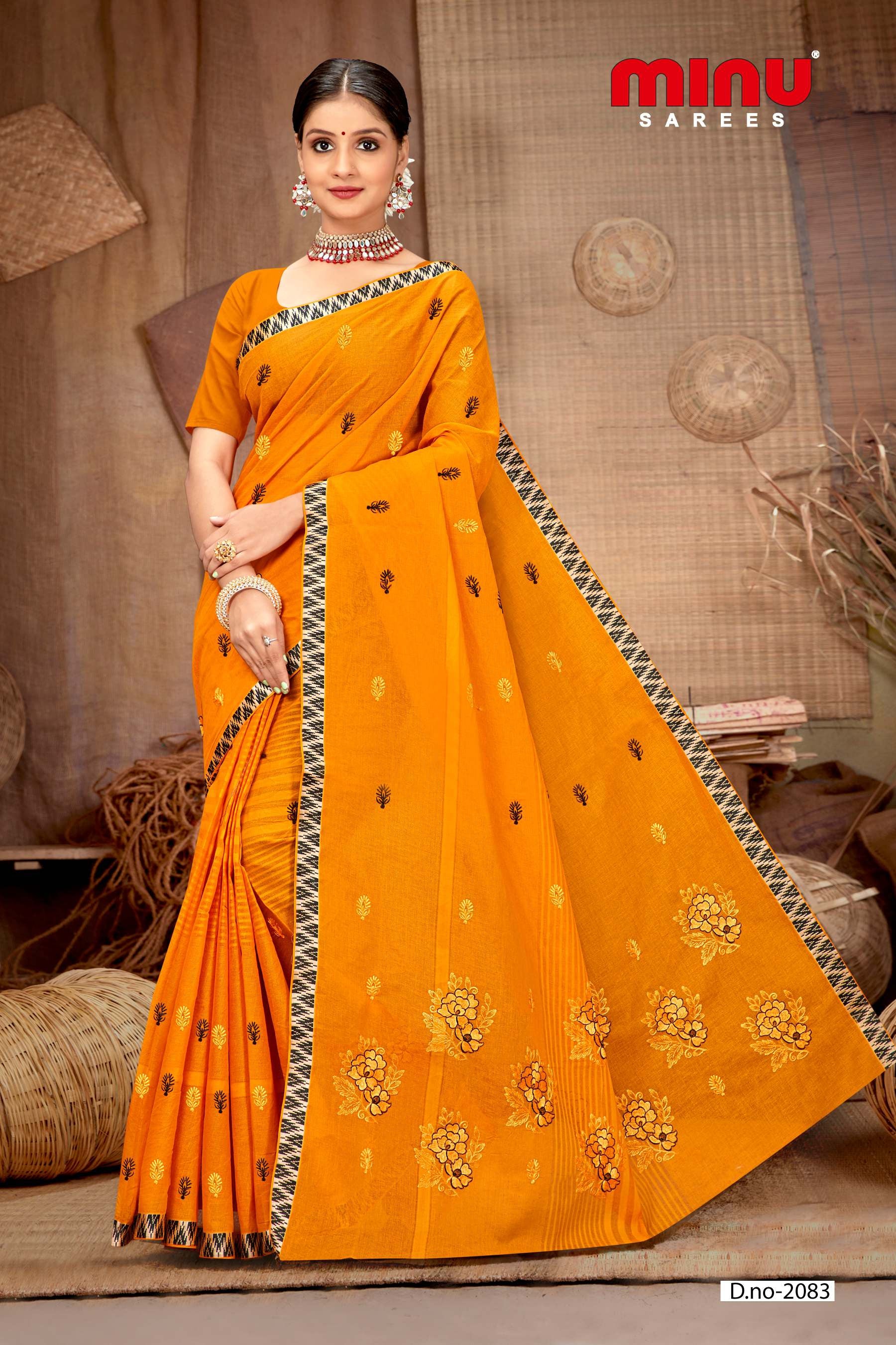 woman wearing embroidered saree at low prices 