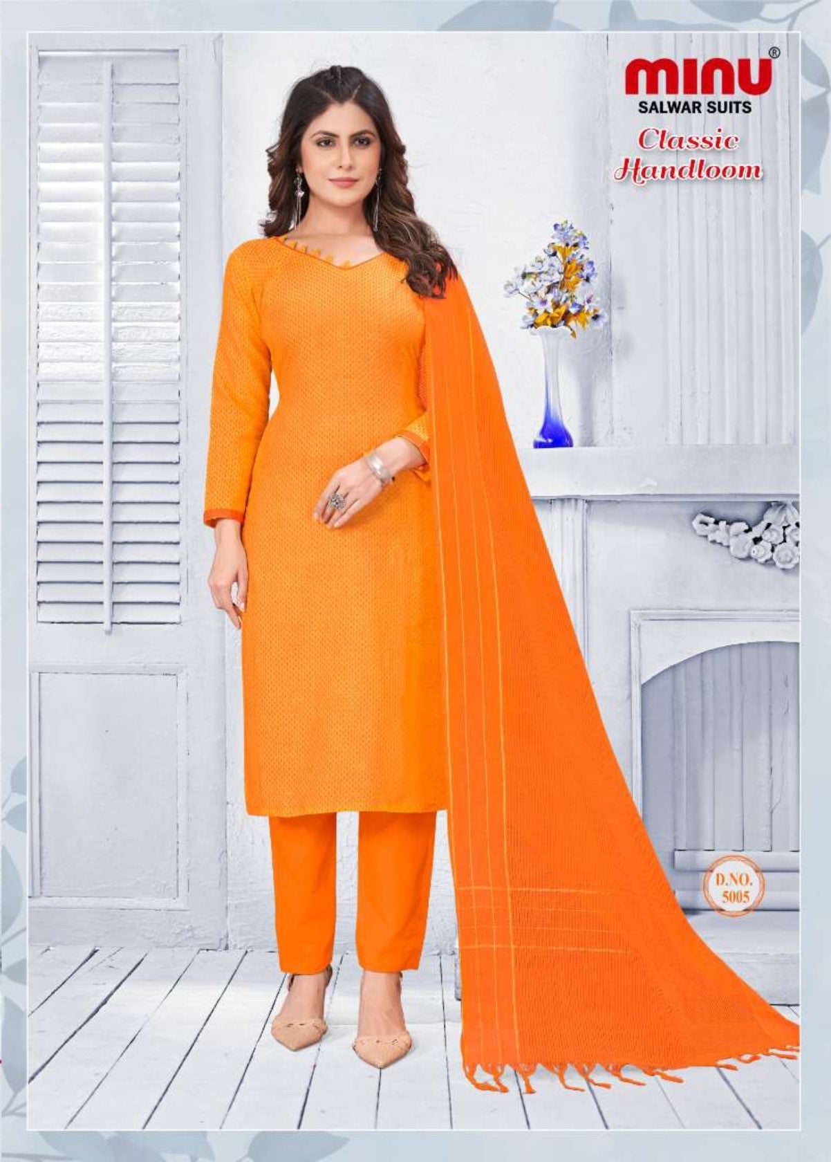 orange salwar suit from ladies suit manufacturer