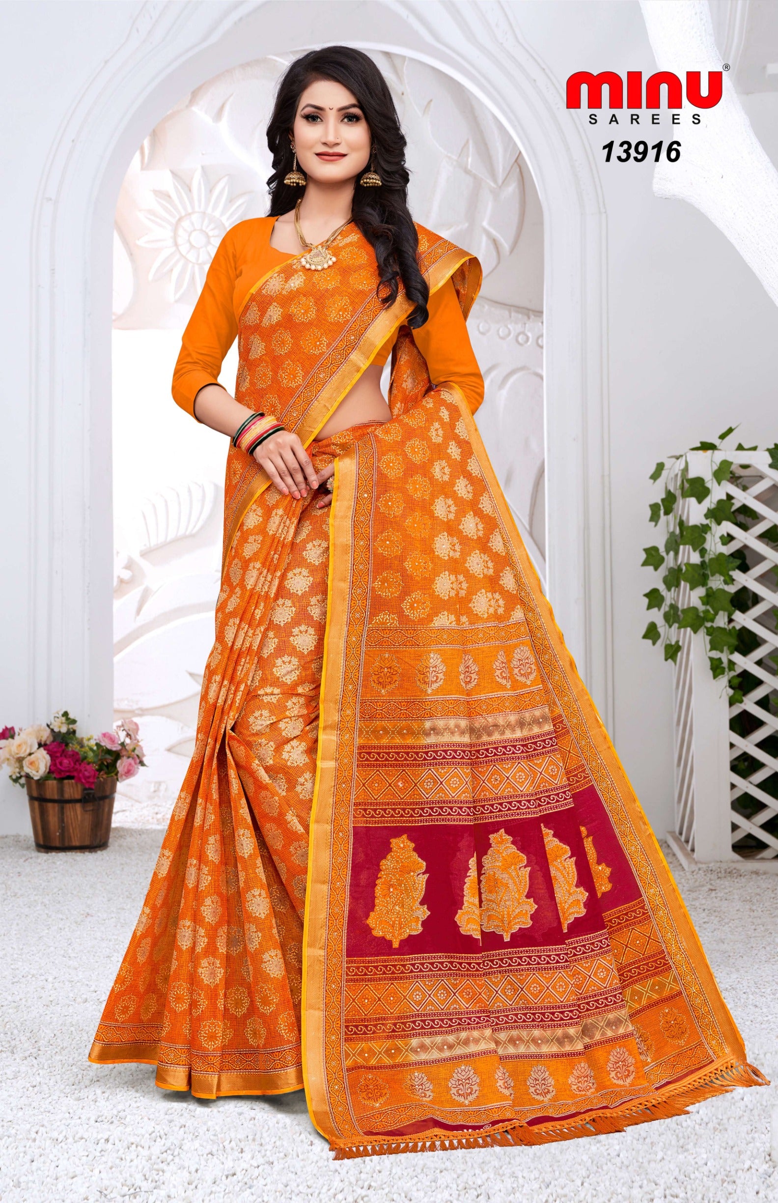 orange color printed cotton saree wearing woman