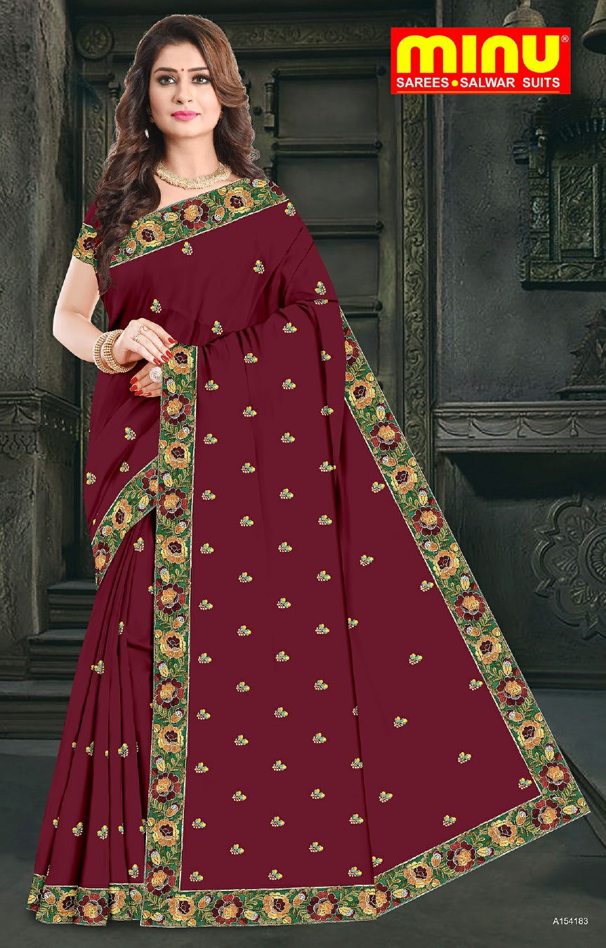 bold and classy embroidery saree wearing woman for sale 