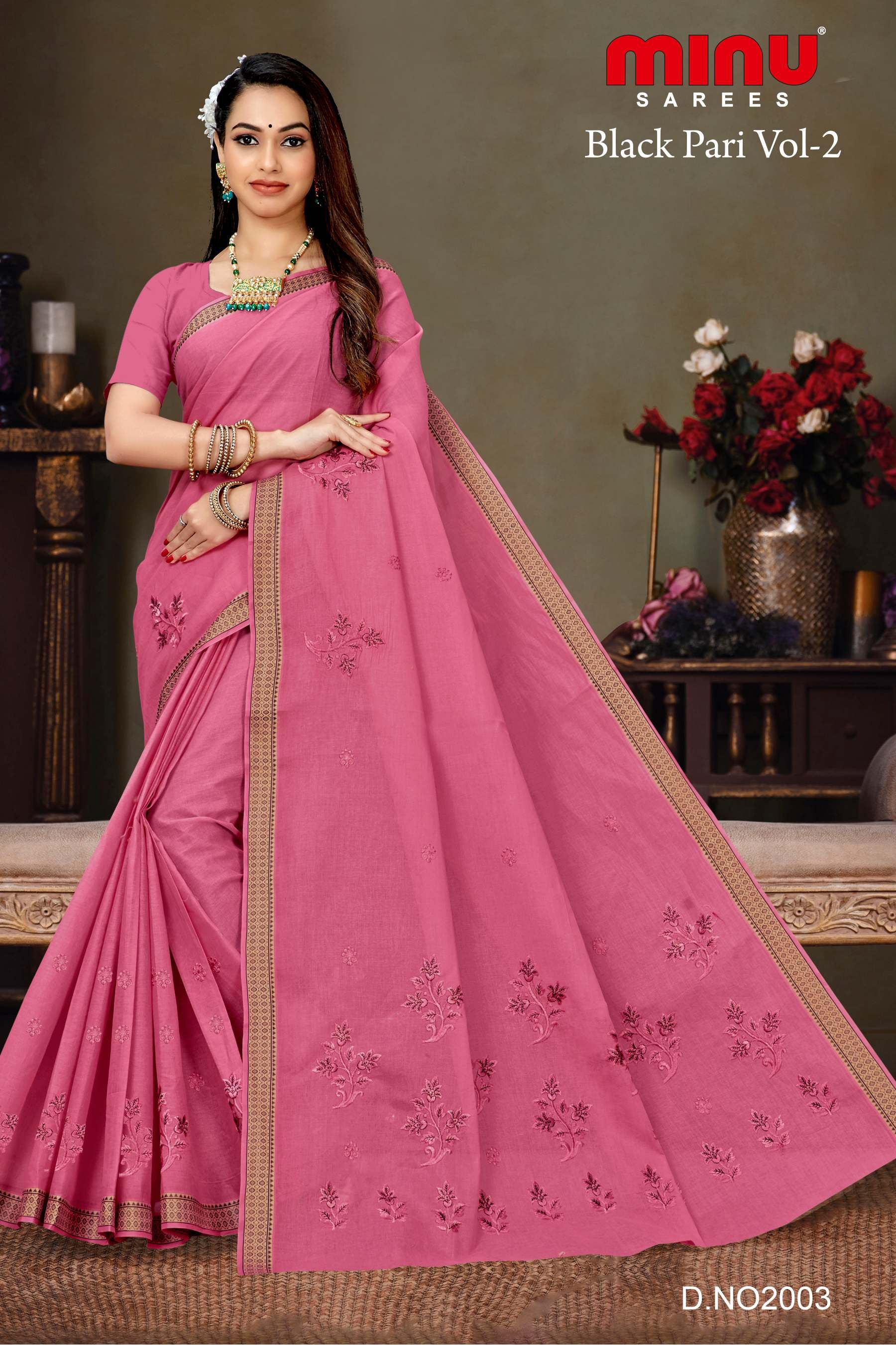 Pink color printed cotton printed saree wearing woman