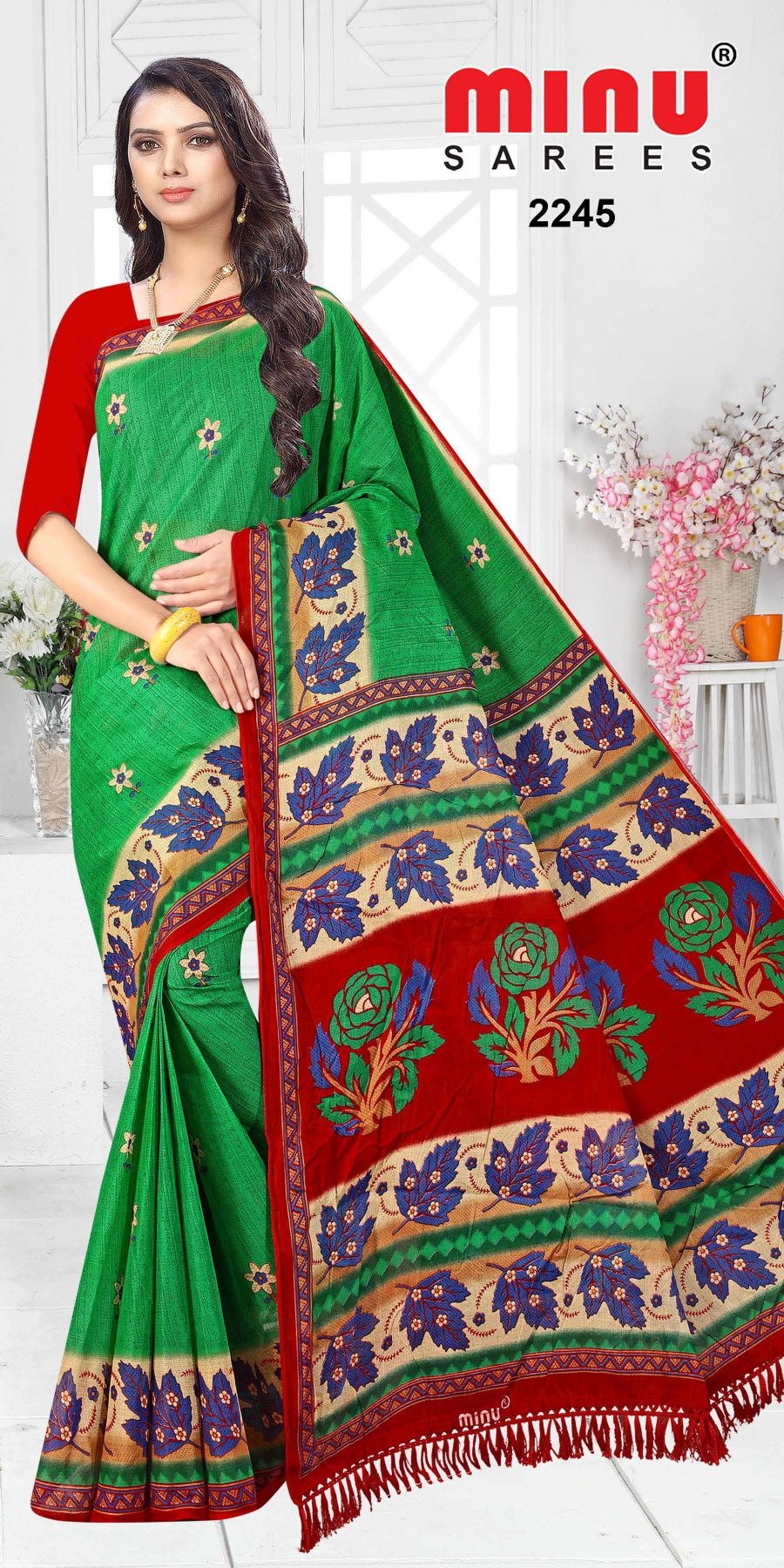 Green printed classy and bold color saree wearing woman image