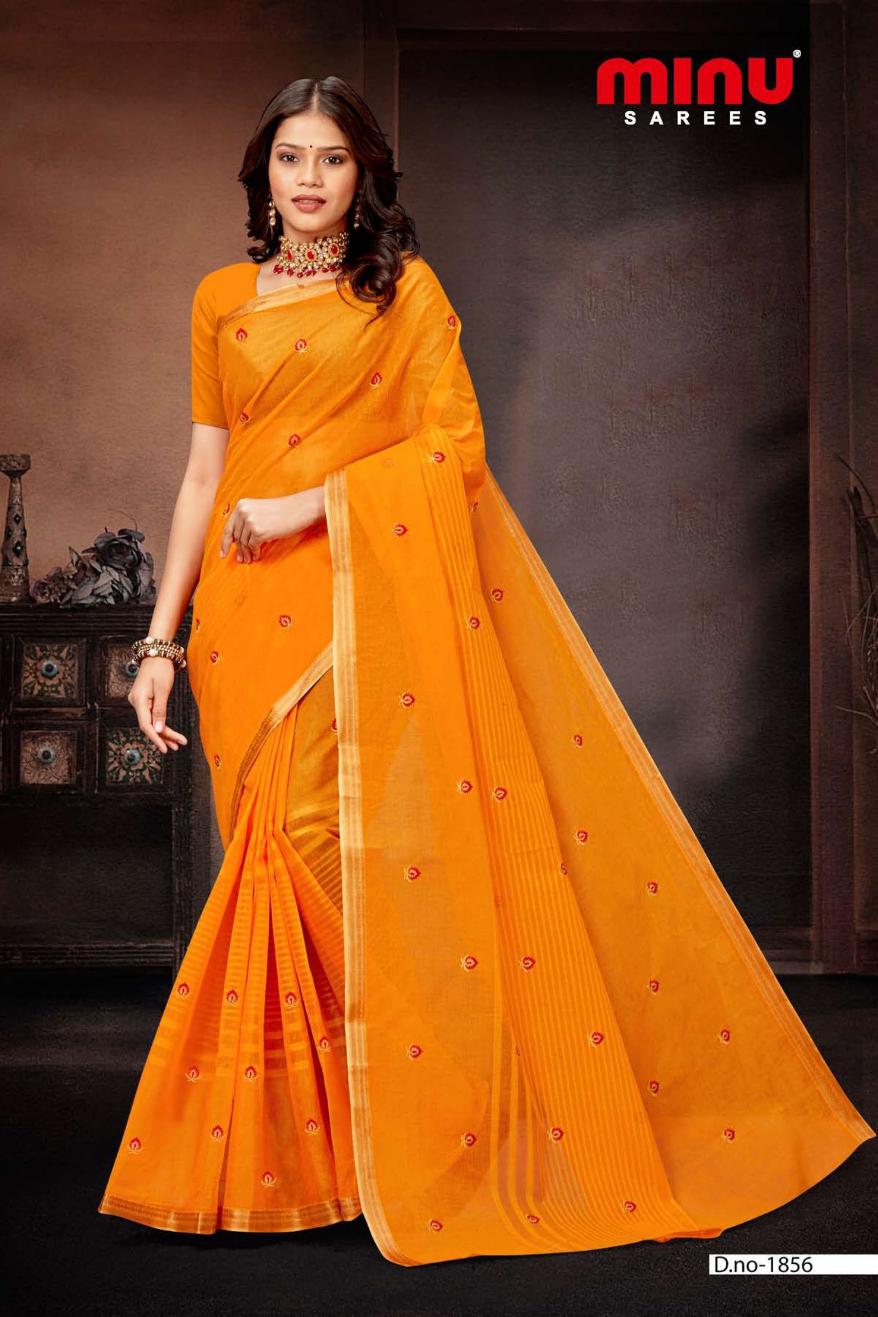 woman wearing orange printed embroidered saree online 