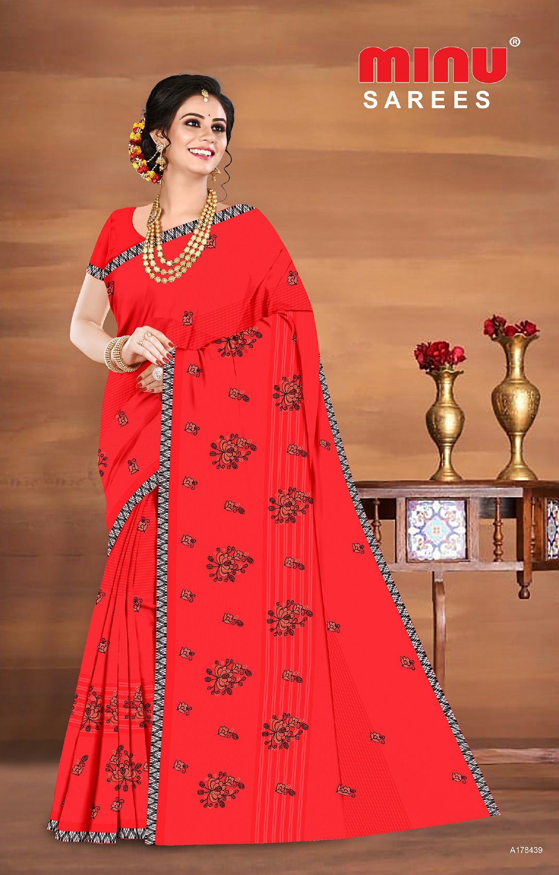 Red color printed embroidered saree wearing woman