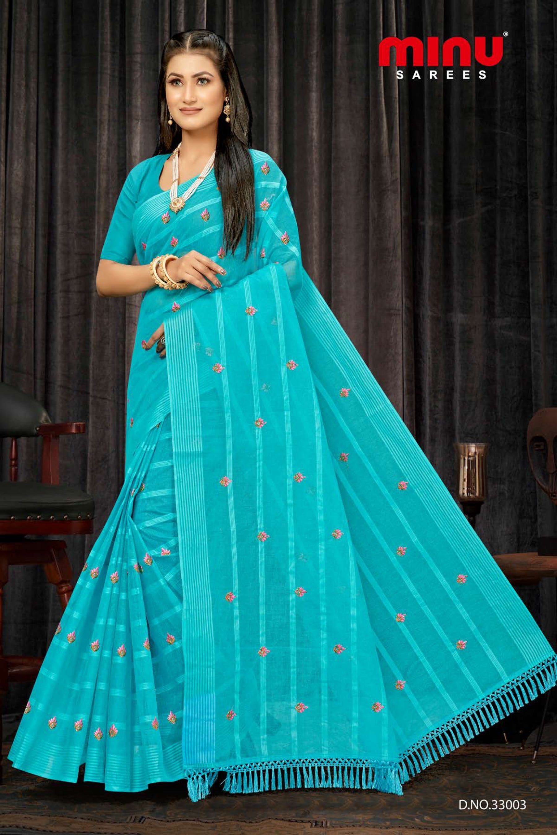 embroidered saree wearing woman