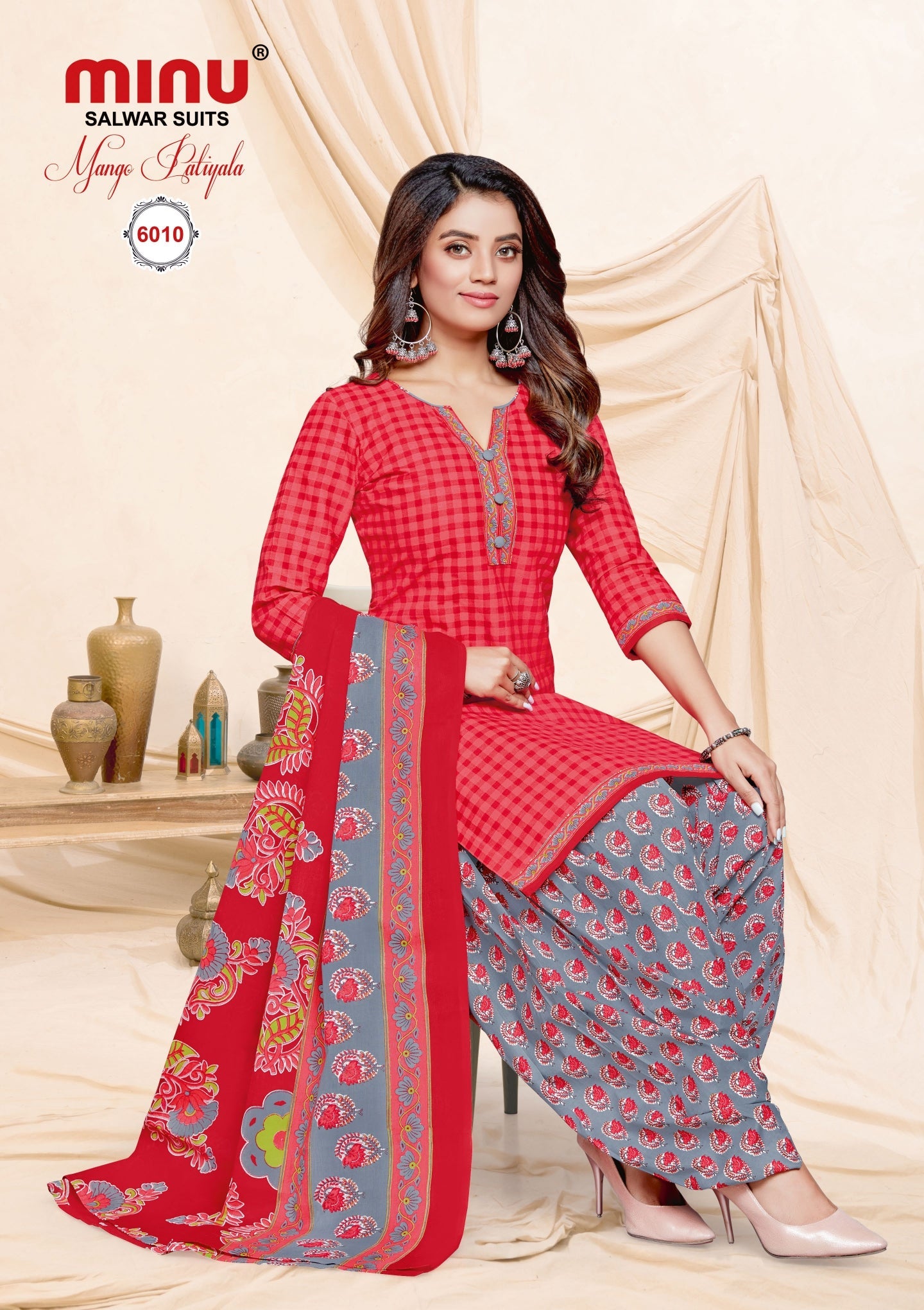 woman wearing modern designed printed salwar suit online image
