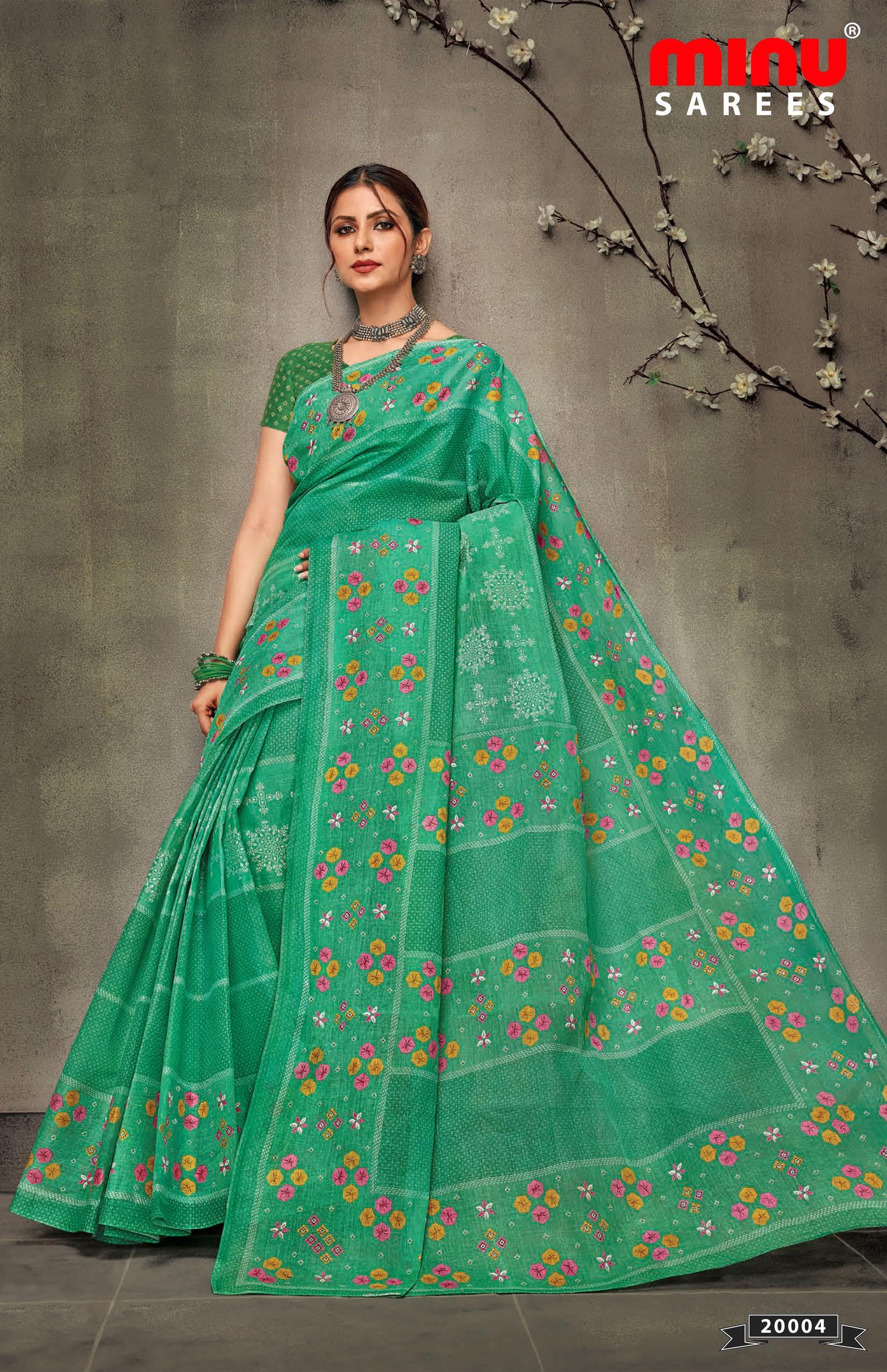 Woman wearing best designer green printed saree