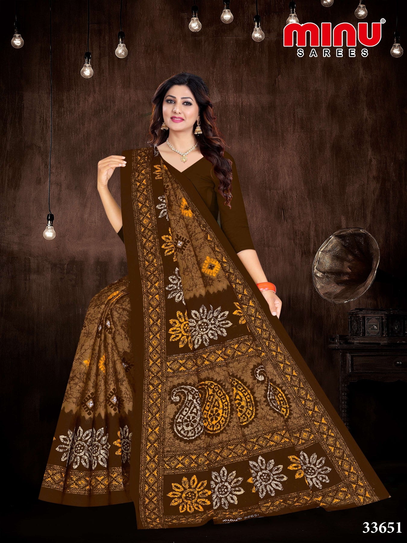 top-quality brown color printed pure cotton saree wearing woman