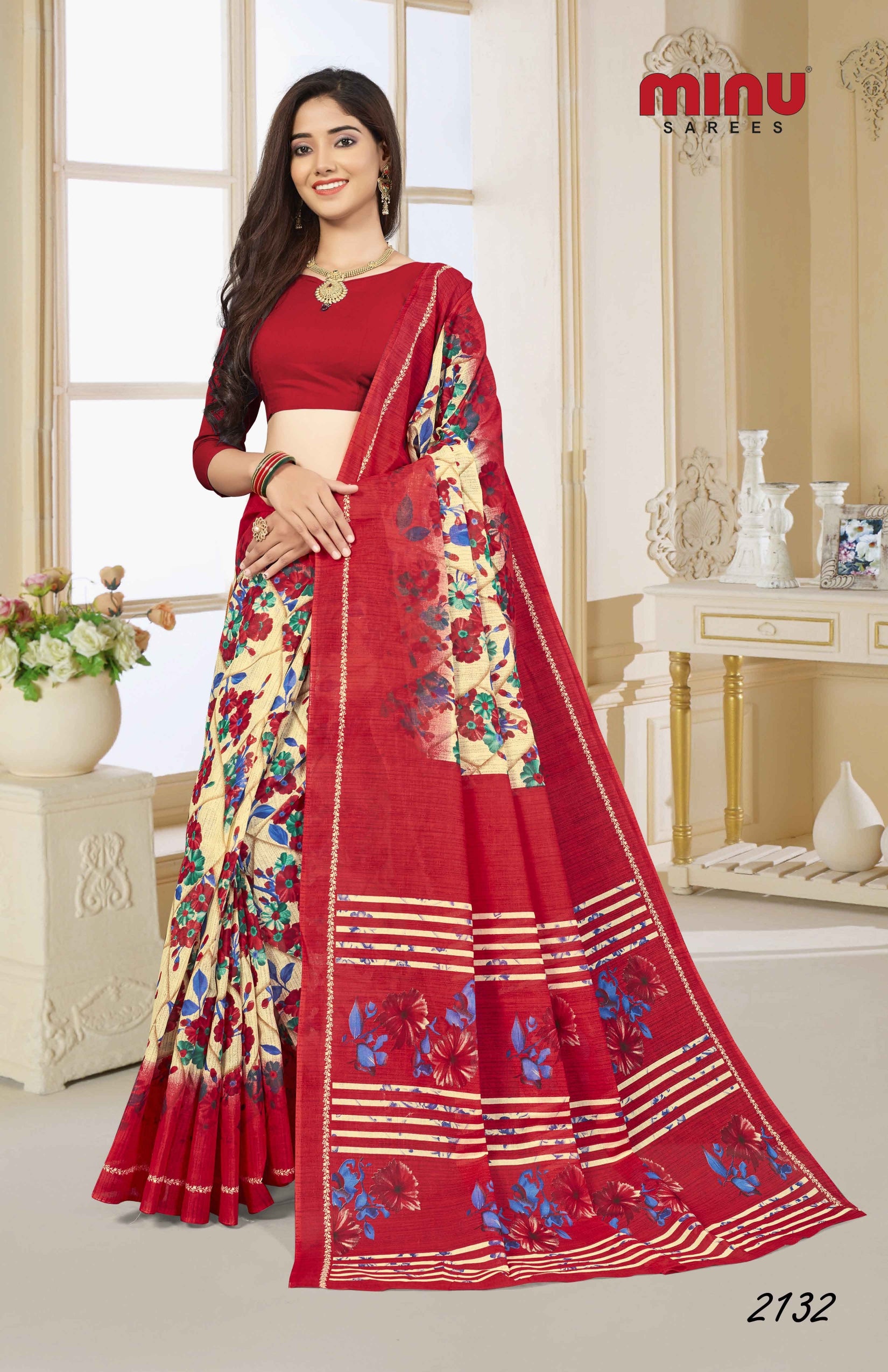 Woman wearing red printed saree designing saree