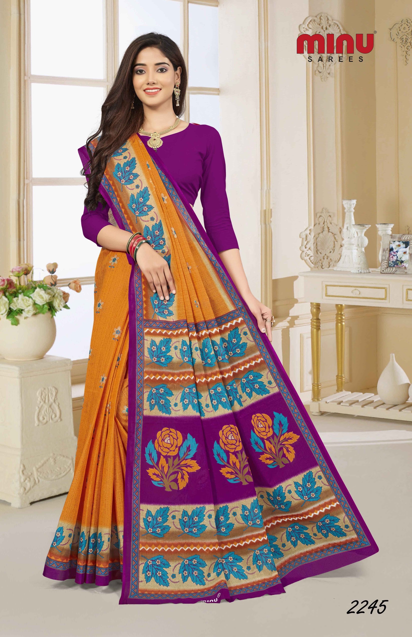 Woman in orange printed saree image