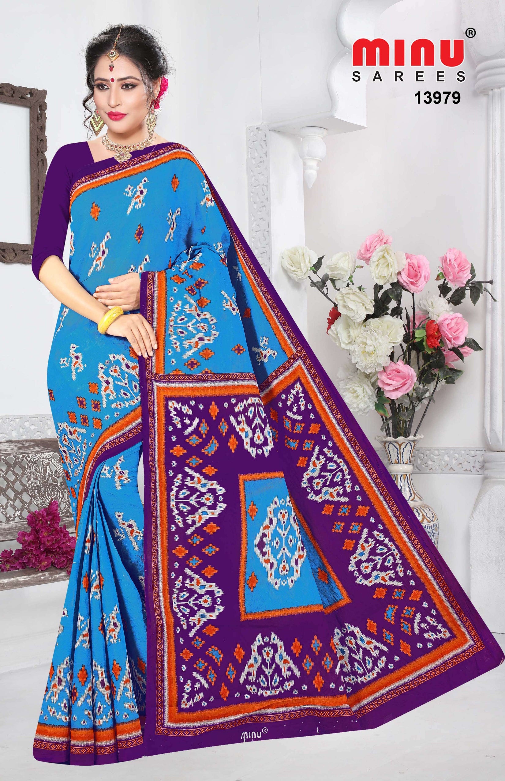 Woman in top-quality color printed saree at best prices image