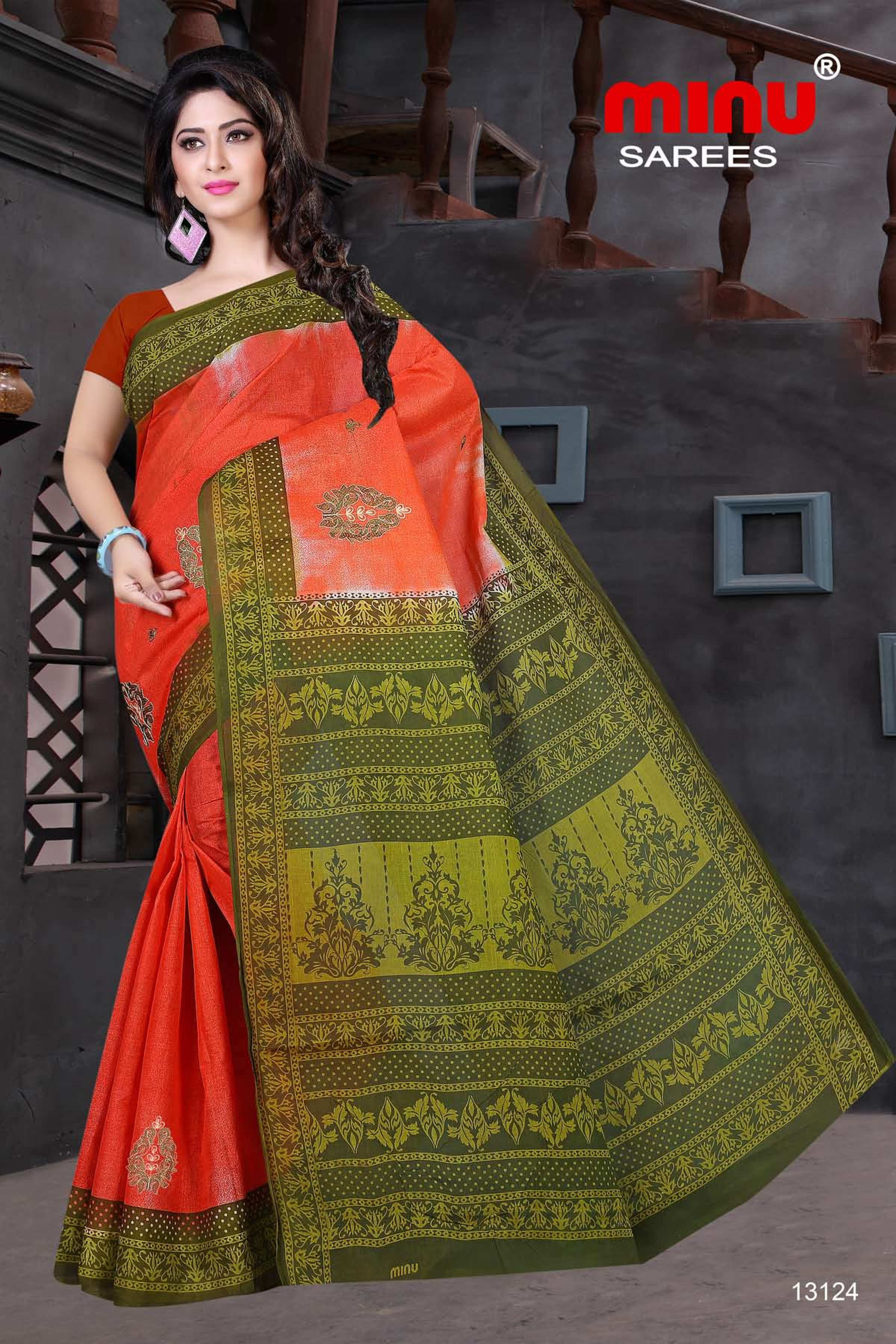woman wearing cotton embroidery sarees online 