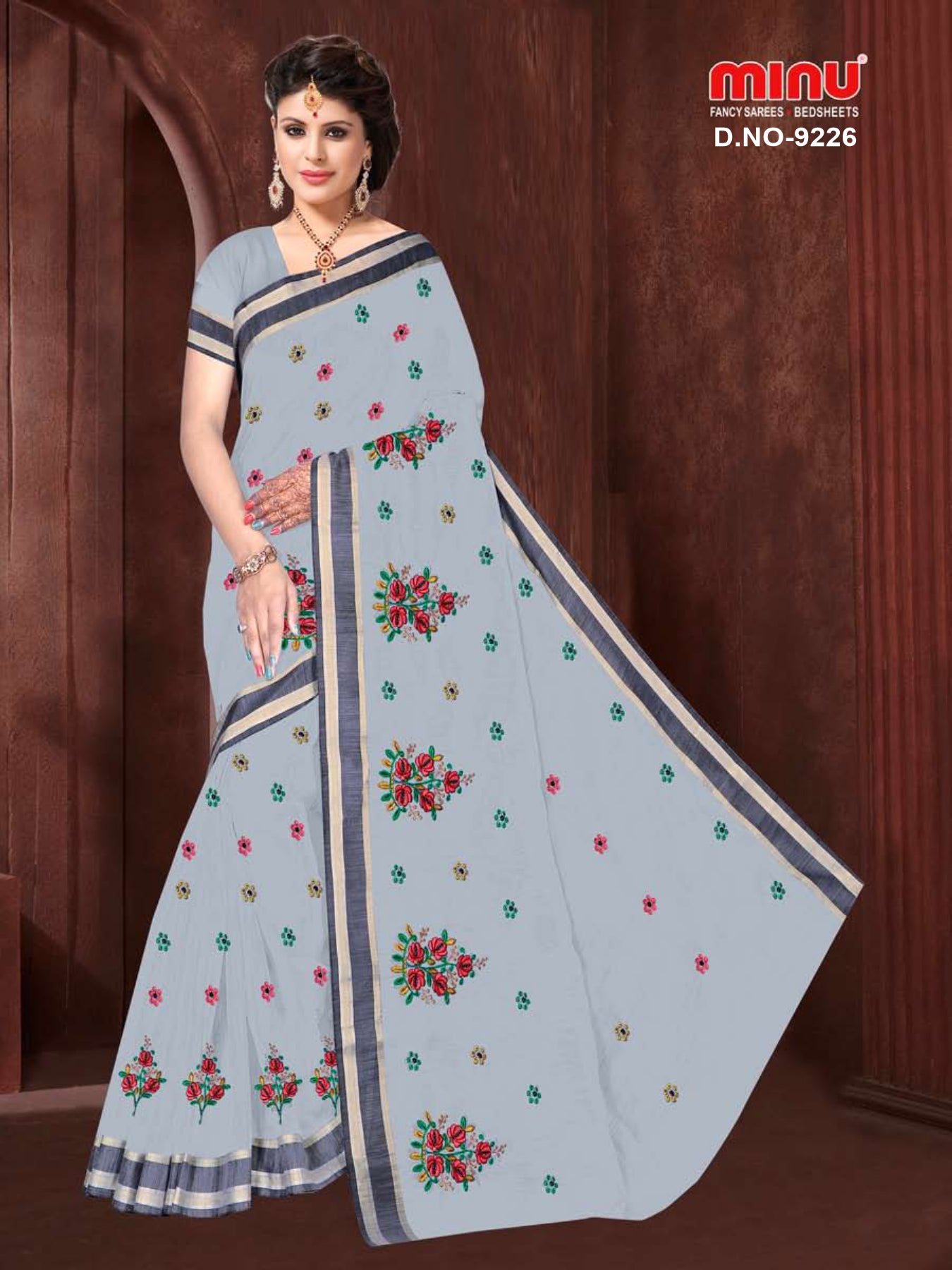 fancy saree with grey in color wearing woman image