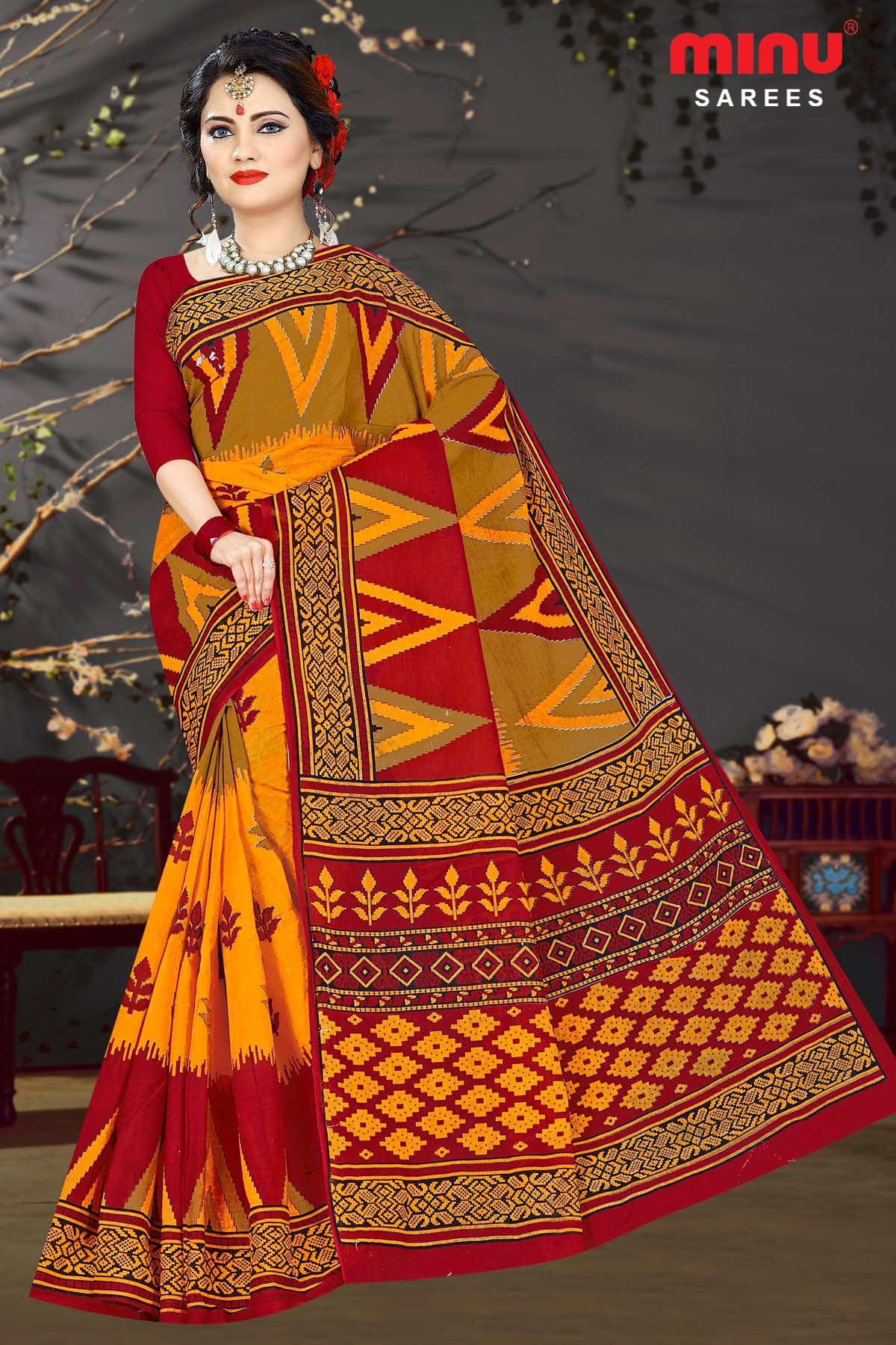 Bold designed red printed saree wearing women image