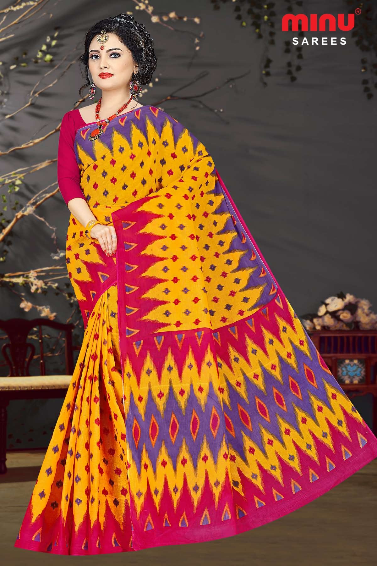 Women looking dashing wearing yellow printed saree