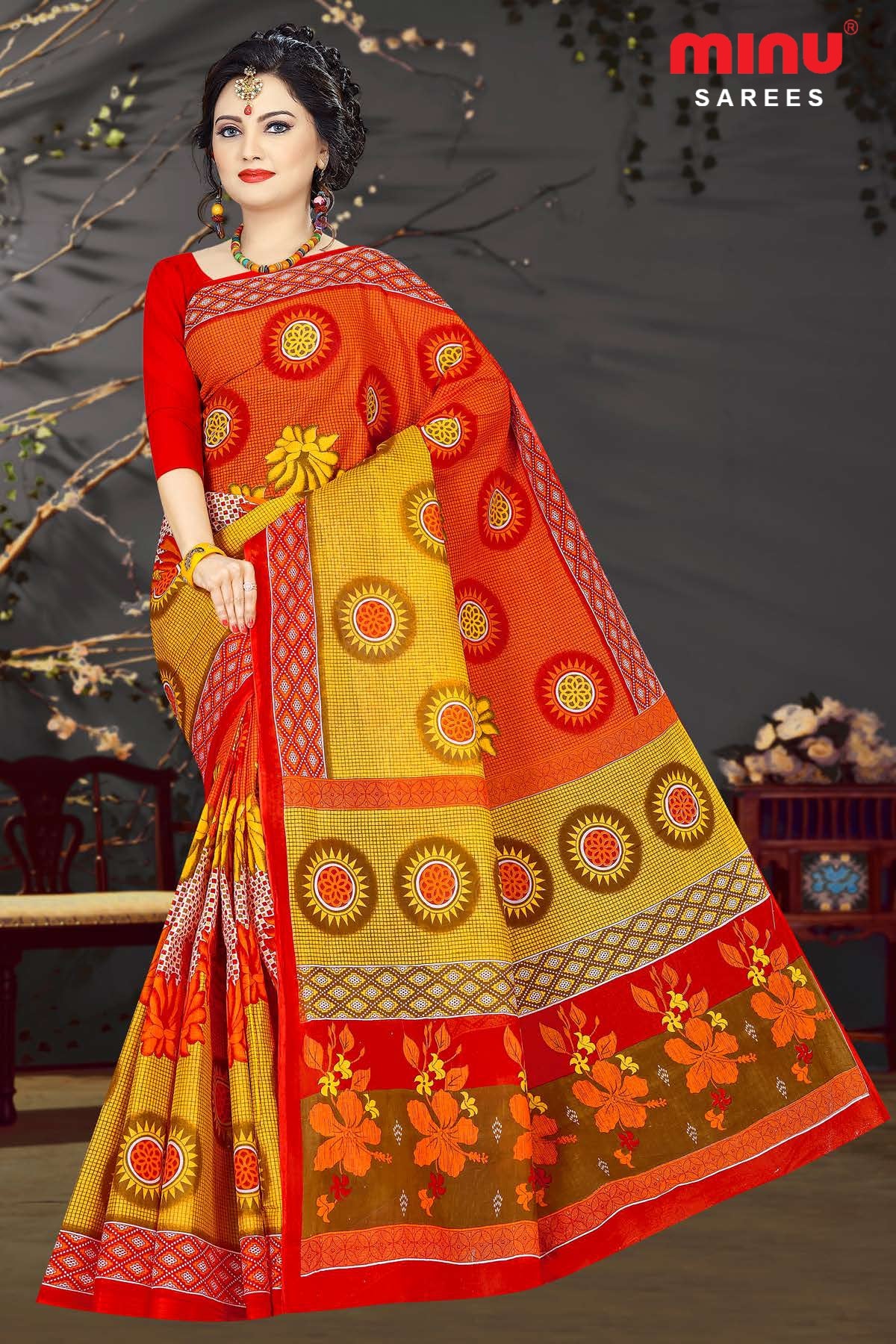 Orange printed saree wearing women image