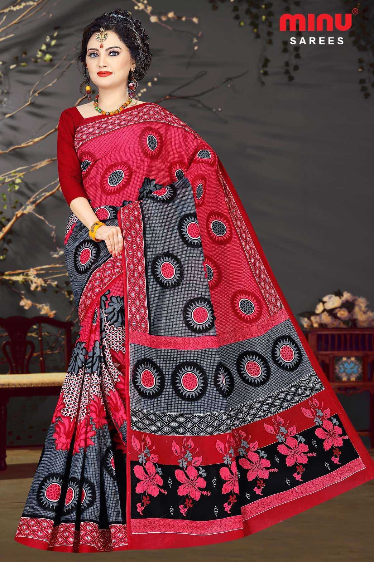 Red printed saree wearing women flaunting her beauty