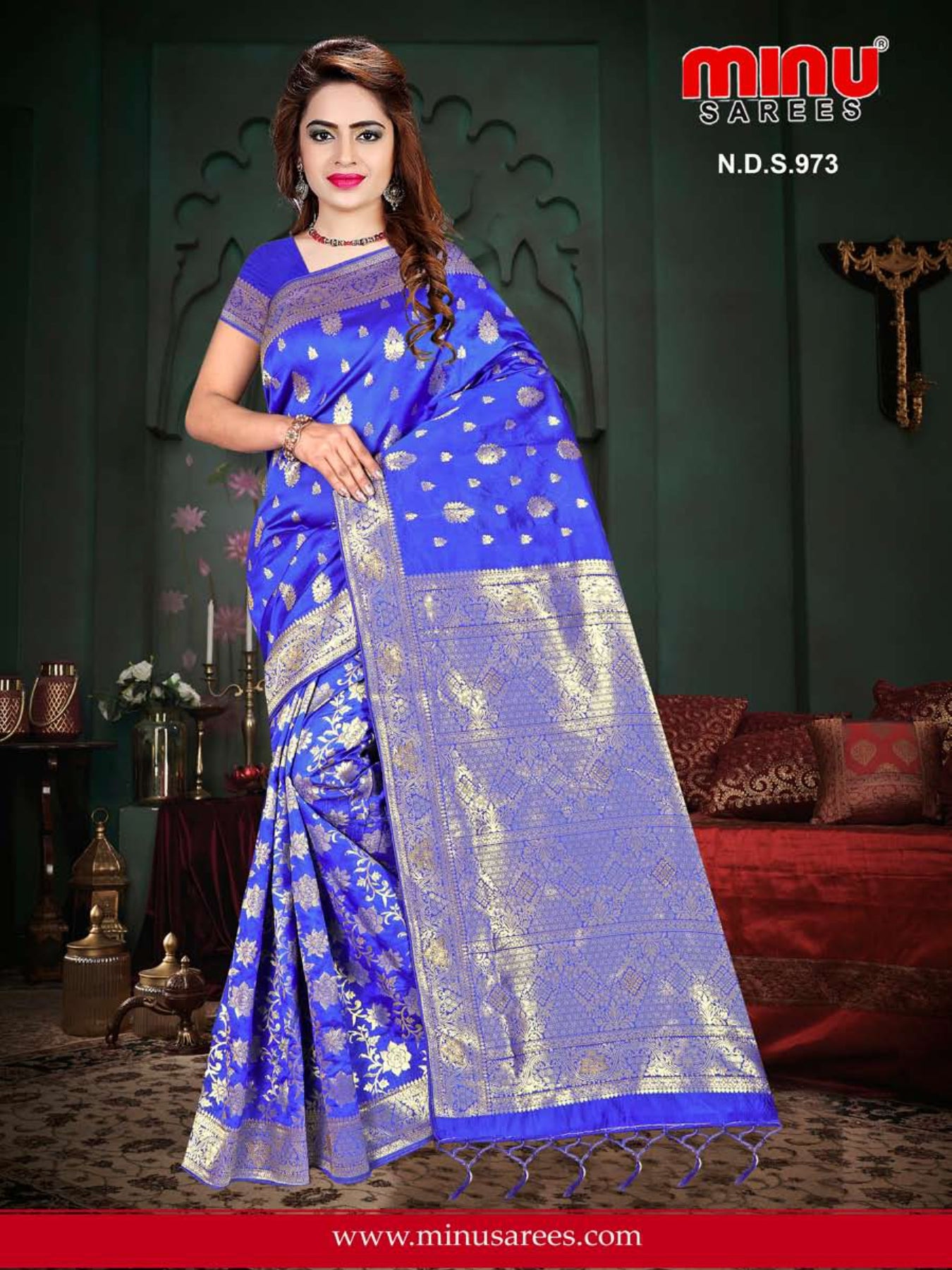 Woman standing in blue color fancy saree for wholesale
