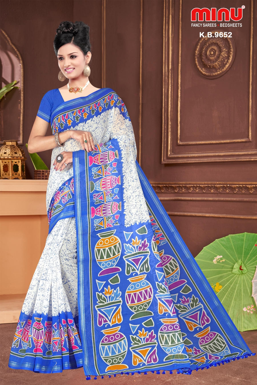 Printed fancy saree wearing woman standing